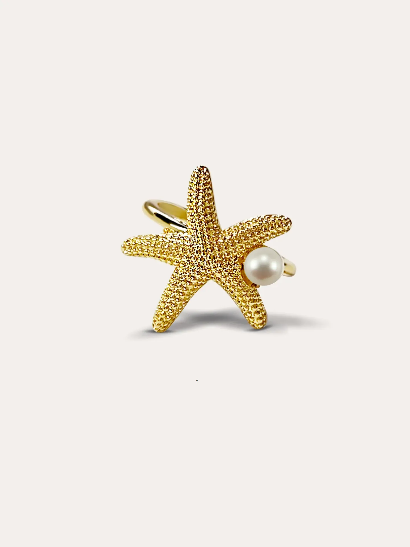 ANILLO ESTRELLA MAR BAÑO ORO